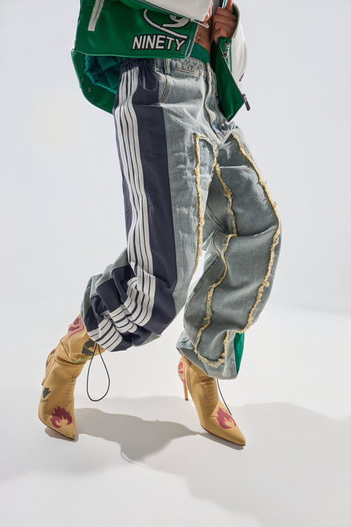ALL AROUND THE WORLD PATCHWORK DENIM JOGGER PANT IN GREEN MULTI