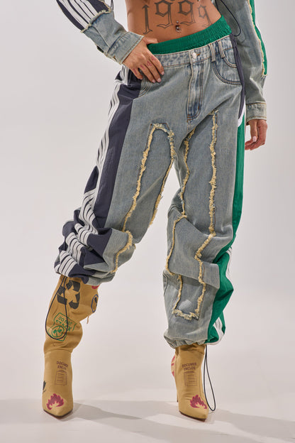 ALL AROUND THE WORLD PATCHWORK DENIM JOGGER PANT IN GREEN MULTI