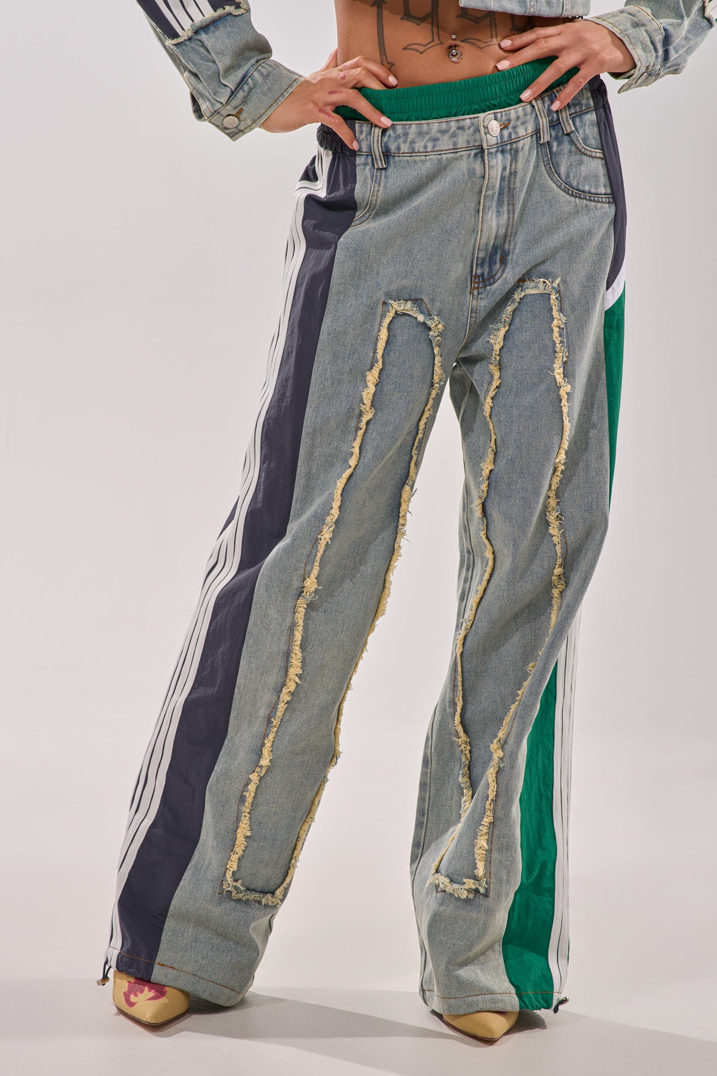 ALL AROUND THE WORLD PATCHWORK DENIM JOGGER PANT IN GREEN MULTI