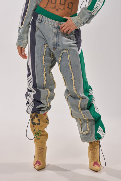 ALL AROUND THE WORLD PATCHWORK DENIM JOGGER PANT IN GREEN MULTI