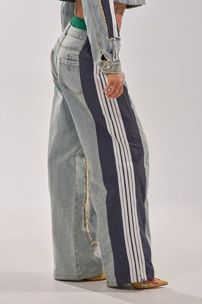 ALL AROUND THE WORLD PATCHWORK DENIM JOGGER PANT IN GREEN MULTI