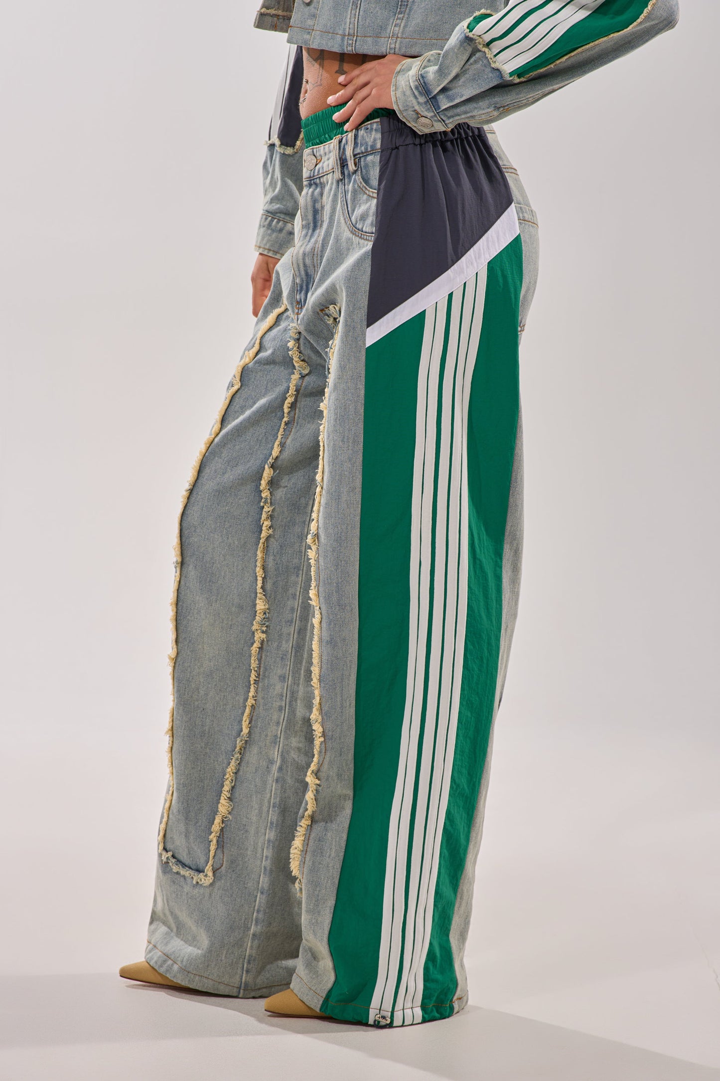 ALL AROUND THE WORLD PATCHWORK DENIM JOGGER PANT IN GREEN MULTI