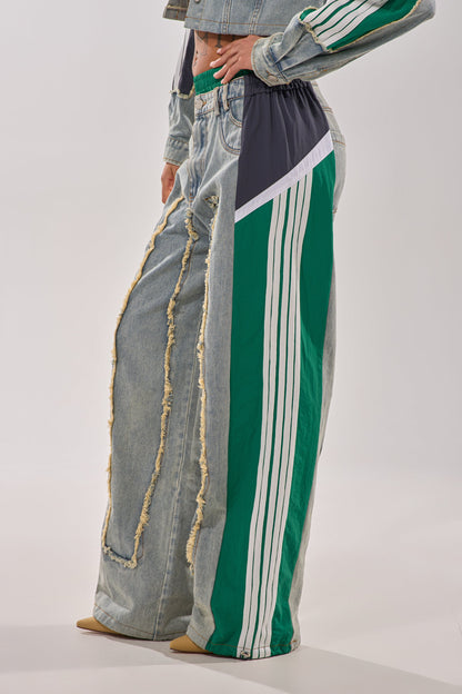 ALL AROUND THE WORLD PATCHWORK DENIM JOGGER PANT IN GREEN MULTI